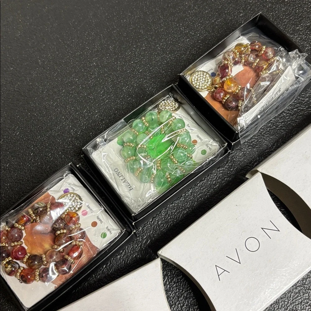 Avon Power of Energy Stretch Bracelets in Brown Green Stability Healing NIB 3